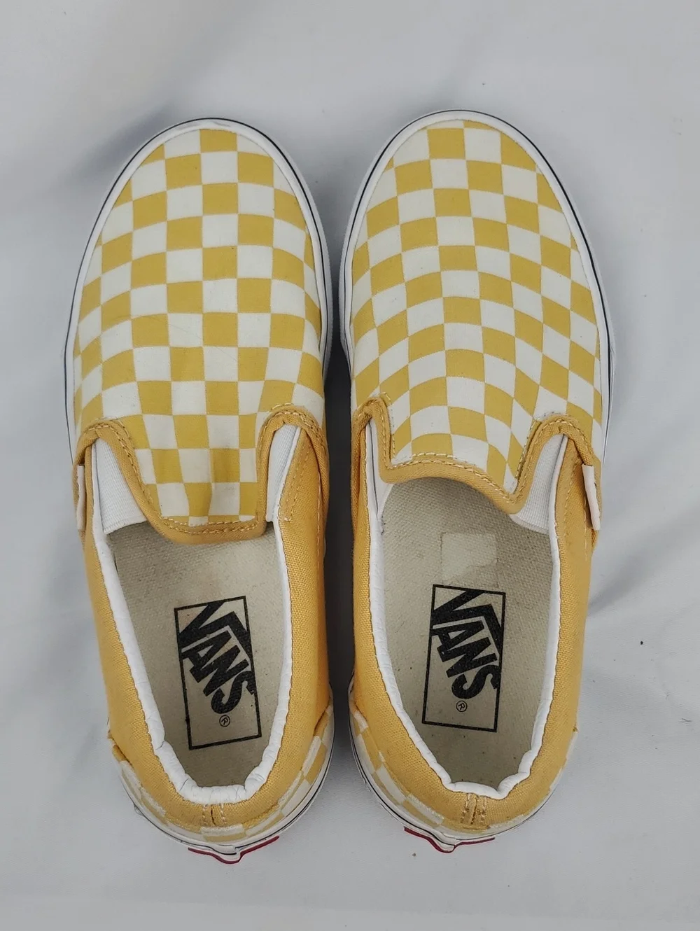 Vans Checkerboard Slip-On Sneakers in Yellow and White